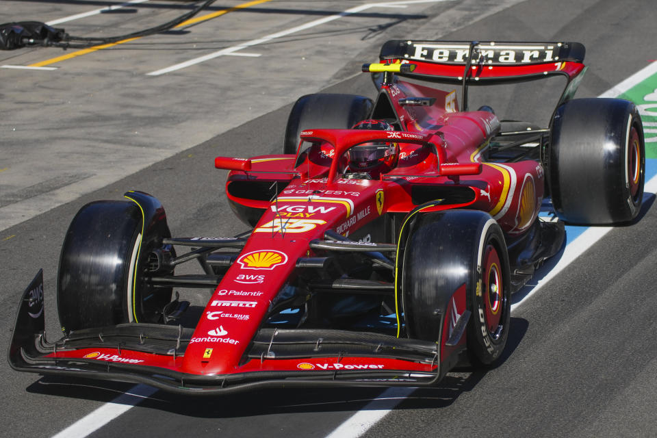 Ferrari driver Carlos Sainz of Spain steers his car out of pit lane during the Australian Formula One Grand Prix at Albert Park, in Melbourne, Australia, Sunday, March 24, 2024. (AP Photo/Scott Barbour)