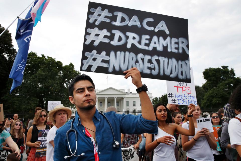 Nursing student Carlos Esteban, a DACA recipient, rallies outside the White House on Sept. 5, 2017.