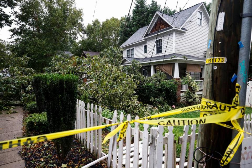 A fallen tree lays in the front yard of 3023 Holt Street as Hurricane Ian and its remnants begins to arrive in Charlotte, N.C., Friday., Sept. 30, 2022.