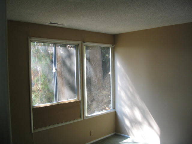 Before: Bedroom in the upper unit