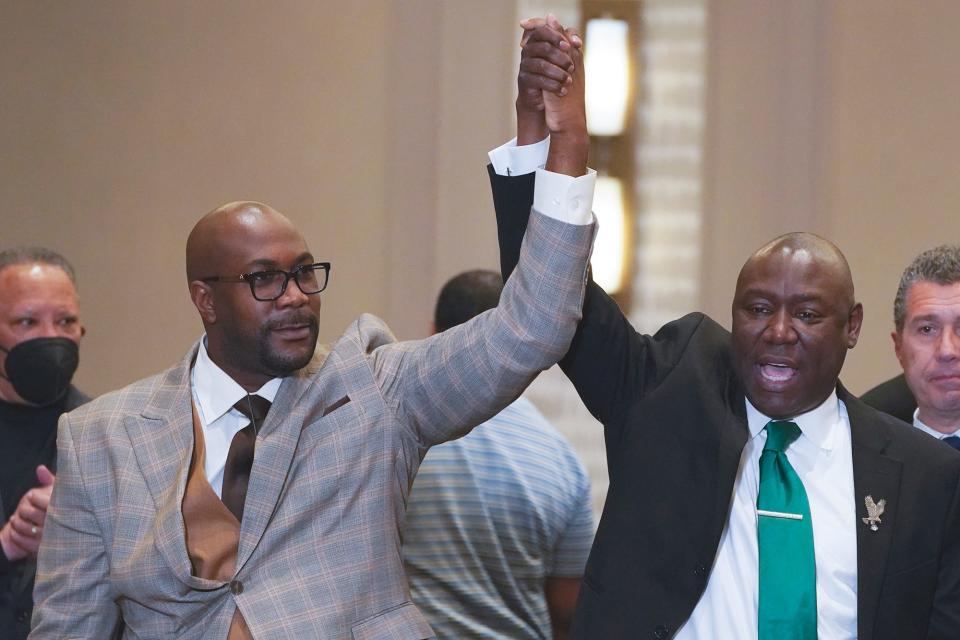 Philonise Floyd and Attorney Ben Crump, from left, react after a guilty verdict was announced at the trial of former Minneapolis police Officer Derek Chauvin for the 2020 death of George Floyd, Tuesday, April 20, 2021, in Minneapolis, Minn. Former Minneapolis police Officer Derek Chauvin has been convicted of murder and manslaughter in the death of Floyd.