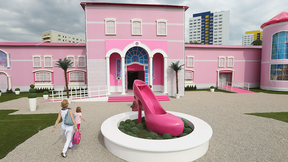 BERLIN, GERMANY - MAY 16:  Visitors arrive at the Barbie Dreamhouse Experience on May 16, 2013 in Berlin, Germany. The Barbie Dreamhouse is a life-sized house full of Barbie fashion, furniture and accessories and will be open to the public until August 25 before it moves on to other cities in Europe.  (Photo by Sean Gallup/Getty Images)