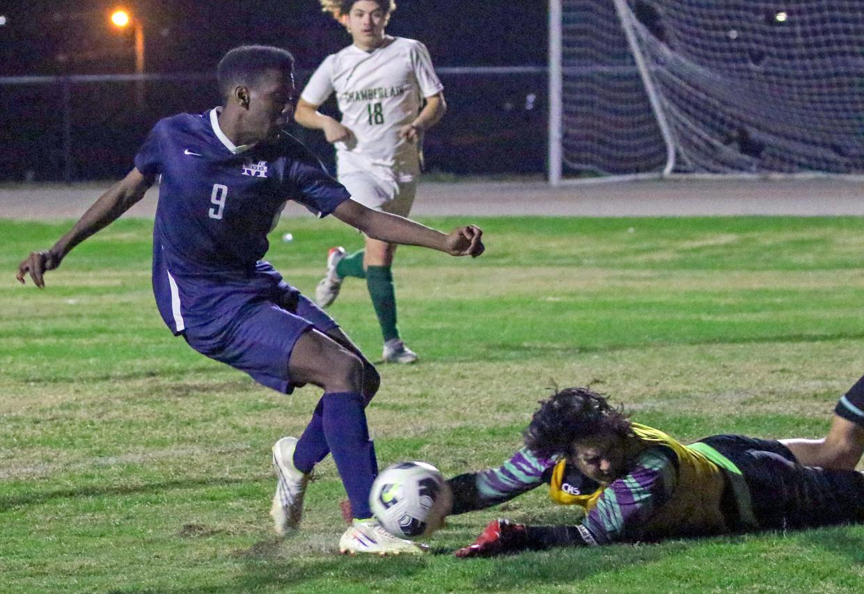 McKeel's Calvin Steele gets blocked by Chamberlain's goalkeeper in the second half. He later scored his third goal.