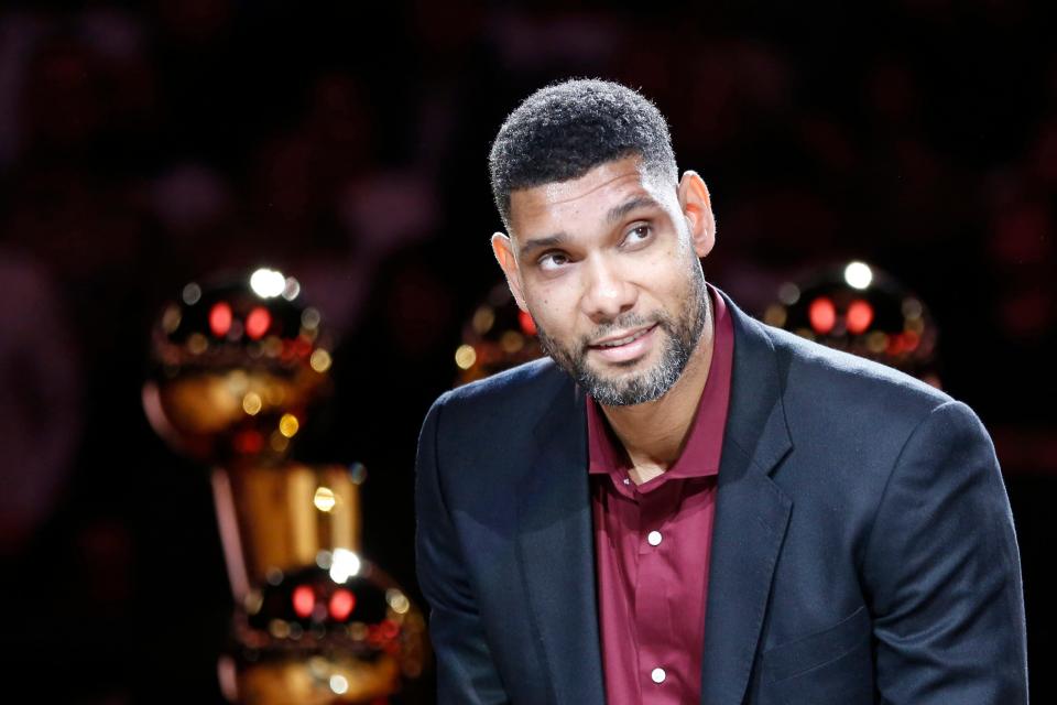 Tim Duncan smiles during a ceremony to retire his No. 21jersey in 2016.