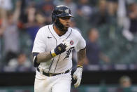 Detroit Tigers' Harold Castro hits a single against the Chicago Cubs in the 10th inning of a baseball game in Detroit, Saturday, May 15, 2021. Detroit won 9-8. (AP Photo/Paul Sancya)