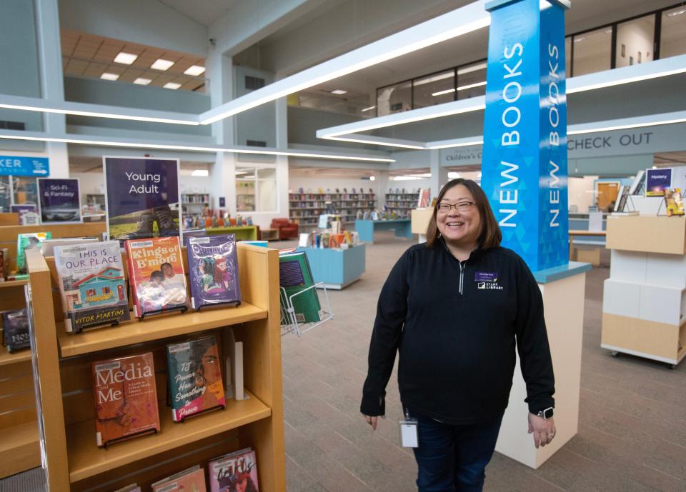 Stark County Library Director Mary Ellen Icaza talks about renovation ideas in the main area of the downtown Canton library. The Stark Library is planning to construct a new 70,000-square-foot Main Library.