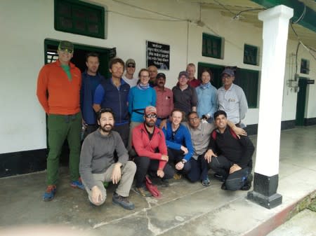 Climbers pose for a picture before leaving for their expedition in Munsiyari