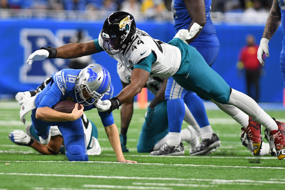 Dec 4, 2022; Detroit, Michigan, USA; Detroit Lions quarterback Jared Goff (16) gets sacked by Jacksonville Jaguars linebacker Travon Walker (44) in the second quarter at Ford Field. Mandatory Credit: Lon Horwedel-USA TODAY Sports