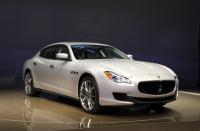 FILE - In this Jan. 14, 2013 file photo, the 2014 Maserati Quattroporte debuts at media previews for the North American International Auto Show in Detroit. The Quattroporte sedan is longer and lighter than before, but still has Maserati’s distinctive oval grille and elegant, minimalist styling. (AP Photo/Paul Sancya, File)