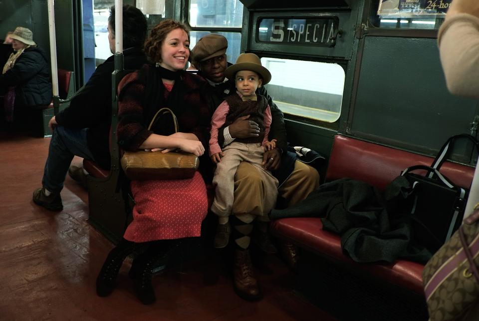 Riders Enjoy Vintage New York City Subway Trains In Annual Holiday Tradition