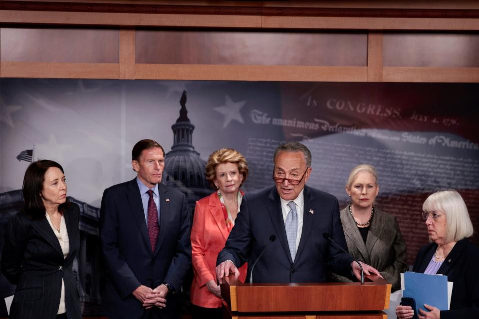 Senate Majority Leader Chuck Schumer, surrounded by Democratic colleagues (from L to R) Sens. Maria Cantwell of Washington, Richard Blumenthal of Connecticut, Debbie Stabenow of Michigan, Kirsten Gillibrand of New York, and Patty Murray of Washington, speaks to reporters during a Capitol Hill press conference in Washington, DC.