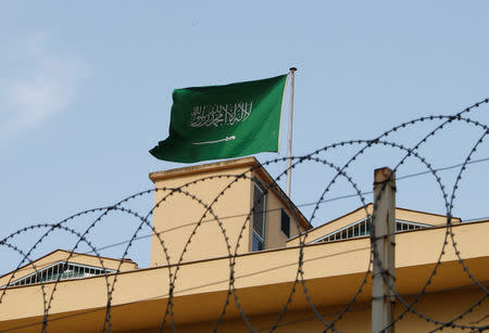 A Saudi flag flutters atop Saudi Arabia's consulate in Istanbul, Turkey October 22, 2018. REUTERS/Murad Sezer