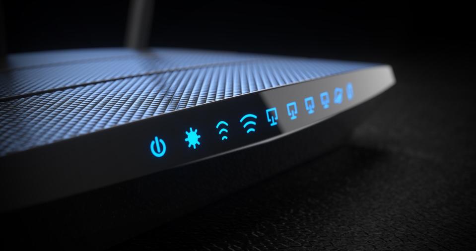 Wireless internet router with status lights on. - Credit: Oleksandr Delyk/Adobe