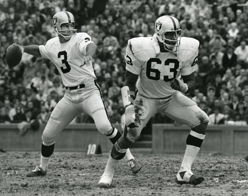 Unknown date 1967; Unknown location, USA; FILE PHOTO; Oakland Raiders Daryle Lamonica (3) sets to throw behind Gene Upshaw (63) during the 1967 season. Mandatory Credit: Malcolm Emmons-USA TODAY Sports