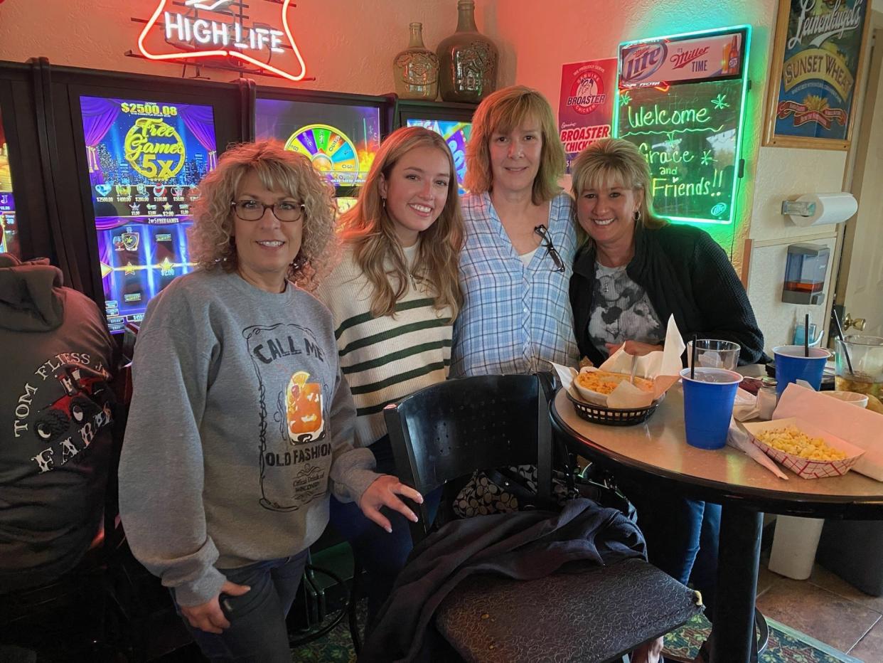Wisconsinite and "Farmer Wants a Wife" finalist Grace Girard at a watch party on April 25, 2024, at The Depot Restaurant & Tavern in Caledonia. She's photographed with attendees Vicki Rosploch of Mount Pleasant, Michelle Hoffman of Sturtevant and Tania Bishop of Caledonia.
