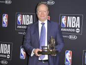 NBA coach Mike Budenholzer, of the Milwaukee Bucks, poses in the press room with the coach of the year award poses in the press room at the NBA Awards on Monday, June 24, 2019, at the Barker Hangar in Santa Monica, Calif. (Photo by Richard Shotwell/Invision/AP)