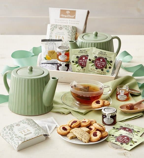 <p><a href="https://go.redirectingat.com?id=74968X1596630&url=https%3A%2F%2Fwww.1800baskets.com%2Fwintry-warmer-tea-gift-tray-171487&sref=https%3A%2F%2Fwww.thepioneerwoman.com%2Ffood-cooking%2Fg38290860%2Fchristmas-gift-baskets%2F" rel="nofollow noopener" target="_blank" data-ylk="slk:Shop Now;elm:context_link;itc:0;sec:content-canvas" class="link rapid-noclick-resp">Shop Now</a></p><p>Wintry Warmer Tea Gift Tray</p><p>1800baskets.com</p><p>$64.99</p><span class="copyright">1-800-Baskets</span>