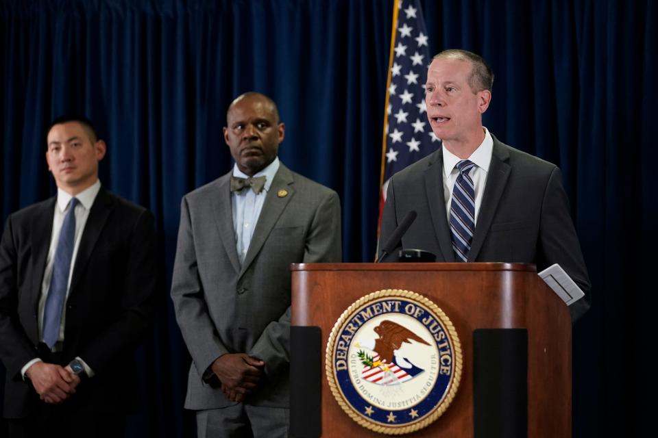 Robert Tripp, special agent in charge of the FBI's San Francisco Field Office, right, speaks to reporters during a press conference to announce federal authorities have charged 10 current and former Northern California police officers in a corruption investigation Thursday, Aug. 17, 2023, in San Francisco. Arrest warrants were served Thursday in California, Texas and Hawaii.