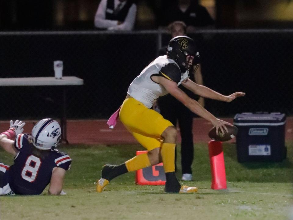 Vikings quarterback Carter Smith scrambles for a touchdown against the Estero defense. The Bishop Verot Vikings visited the Estero High School Wildcats Friday, October 28, 2022 in a week 10 rivalry matchup.