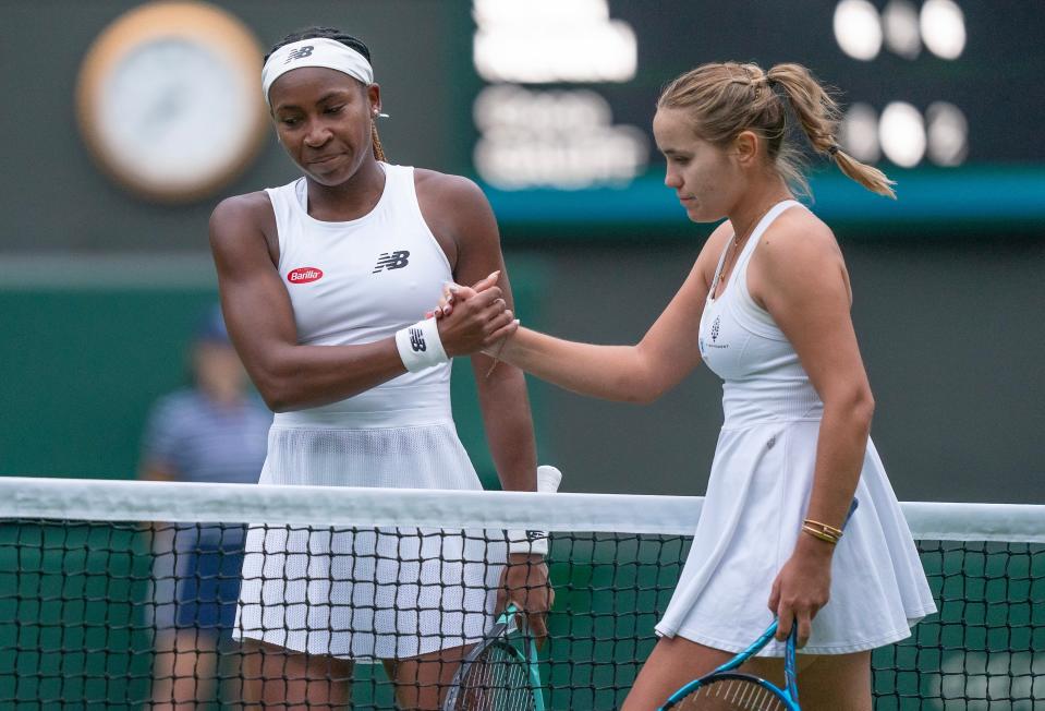 Jul 3, 2023; London, United Kingdom;  Sofia Kenin (USA) shakes hands with Coco Gauff (USA) after a match at the All England Lawn Tennis and Croquet Club. Mandatory Credit: Susan Mullane-USA TODAY Sports