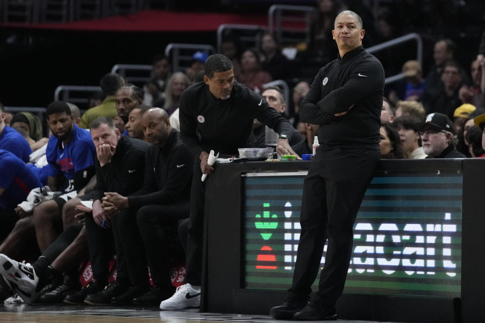 Los Angeles Clippers head coach Tyronn Lue, right, stands on the sideline during the second half of an NBA basketball game against the San Antonio Spurs in Los Angeles, Thursday, Jan. 26, 2023. (AP Photo/Ashley Landis)