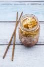 <p>Fermented foods like <a href="https://www.goodhousekeeping.com/health/diet-nutrition/a20707020/is-soy-good-or-bad-for-you/" rel="nofollow noopener" target="_blank" data-ylk="slk:miso, tempeh;elm:context_link;itc:0;sec:content-canvas" class="link ">miso, tempeh</a>, sauerkraut, and kimchi contain <a href="https://www.goodhousekeeping.com/health/diet-nutrition/a34515/probiotics/" rel="nofollow noopener" target="_blank" data-ylk="slk:probiotics;elm:context_link;itc:0;sec:content-canvas" class="link ">probiotics</a>, the friendly bacteria that live in your GI tract and help defend against harmful pathogens and microbes. Eating more probiotics can help take care of your gut microbiome, potentially benefiting that gut-brain connection. </p>