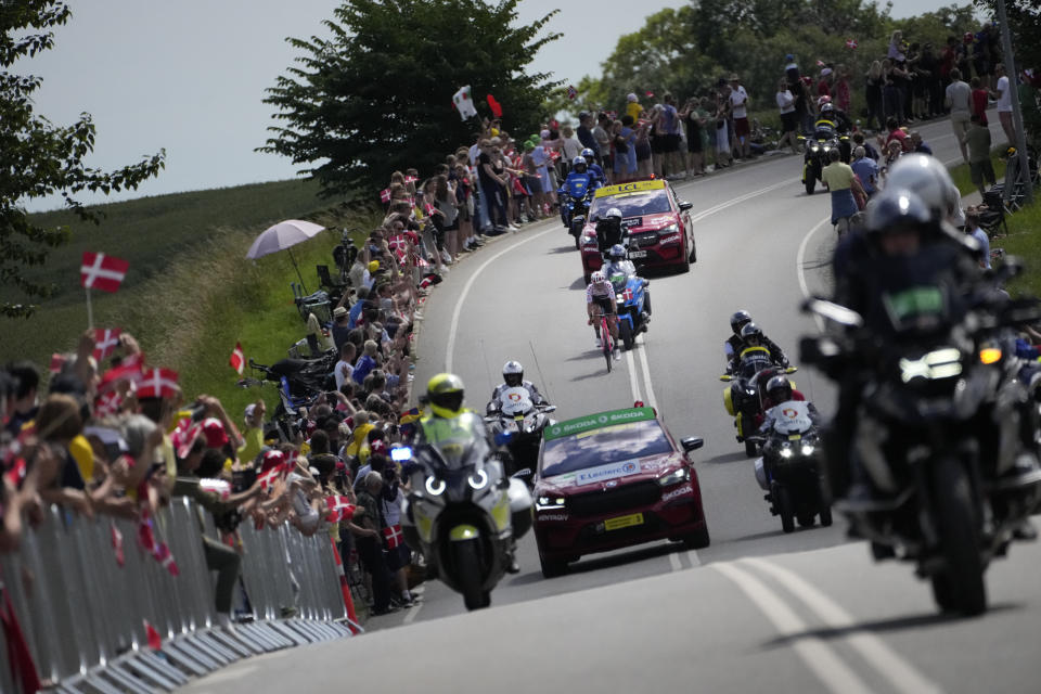 Denmark's Magnus Cort Nielsen rides breakaway in an attempt to gather extra points on a few climbs to consolidate his best climber's dotted jersey during the third stage of the Tour de France cycling race over 182 kilometers (113 miles) with start in Vejle and finish in Sonderborg, Denmark, Sunday, July 3, 2022. (AP Photo/Thibault Camus)