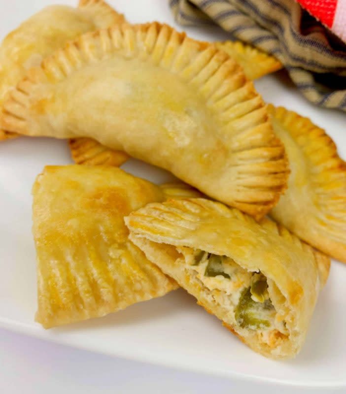 <p>Stylish Cravings</p><p>The delicious filling that’s made with cream cheese, shredded cheddar cheese and jalapeños.</p><p><strong>Get the recipe:</strong> <a href="https://stylishcravings.com/jalapeno-popper-empanadas/" rel="nofollow noopener" target="_blank" data-ylk="slk:Jalapeño Popper Empanadas;elm:context_link;itc:0;sec:content-canvas" class="link ">Jalapeño Popper Empanadas</a></p>