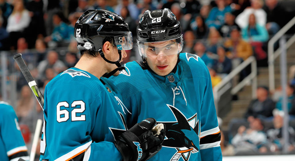 SAN JOSE, CA - FEBRUARY 13: Kevin Labanc #62 and Timo Meier #28 of the San Jose Sharks chat during a NHL game against the Arizona Coyotes at SAP Center on February 13, 2018 in San Jose, California. (Photo by Scott Dinn/NHLI via Getty Images)