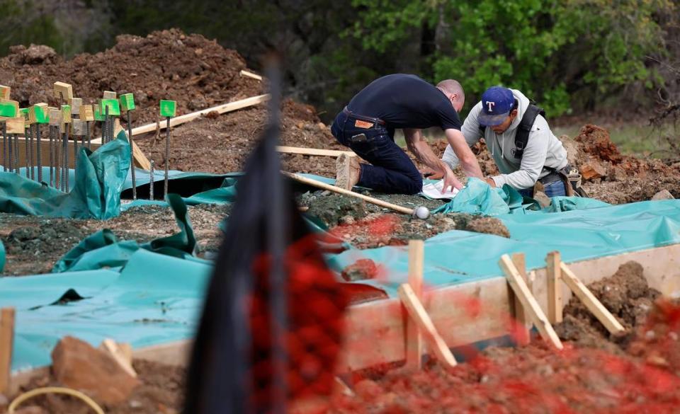 A crew works on the construction of a pavilion at Palo Pinto Mountains State Park on Monday, April 1, 2024.