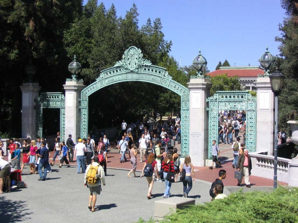 Students enter Sather Gate at the University of California, Berkeley.