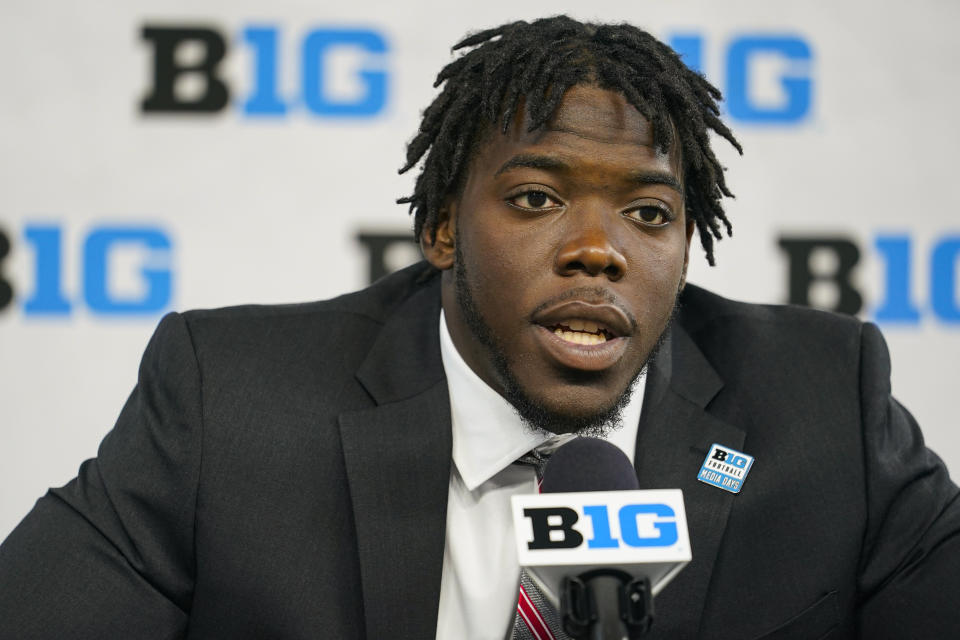 Ohio State defensive end Zach Harrison talks to reporters during an NCAA college football news conference at the Big Ten Conference media days, at Lucas Oil Stadium in Indianapolis, Friday, July 23, 2021. (AP Photo/Michael Conroy)