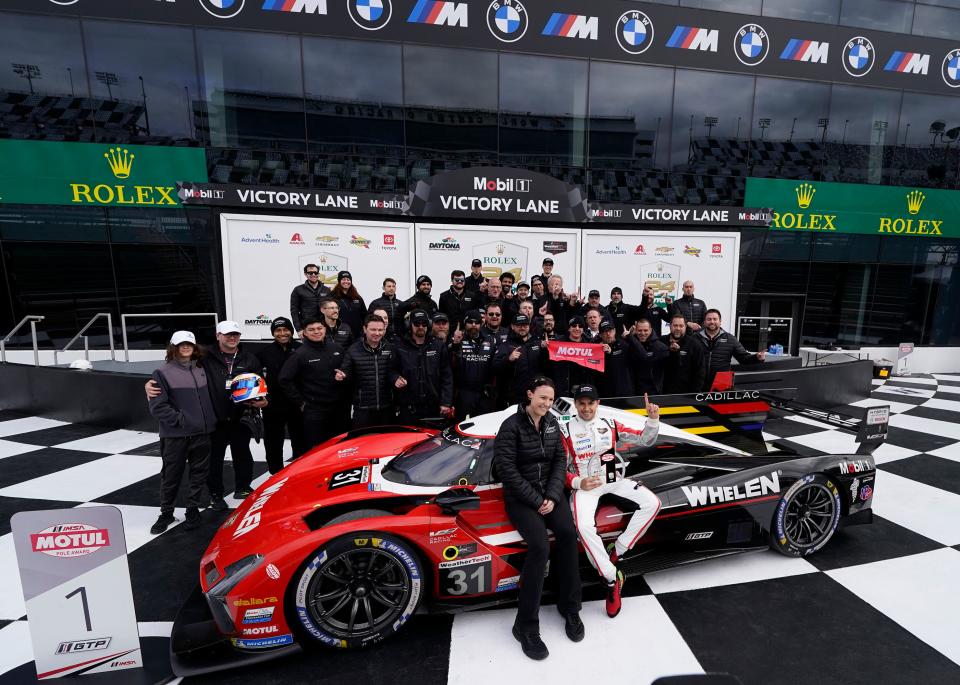 Driver Pipo Derani celebrates after winning the pole position during Roar Before the 24 pole qualifying for the Rolex 24 at Daytona at Daytona International Speedway, Sunday, Jan. 21, 2024.
