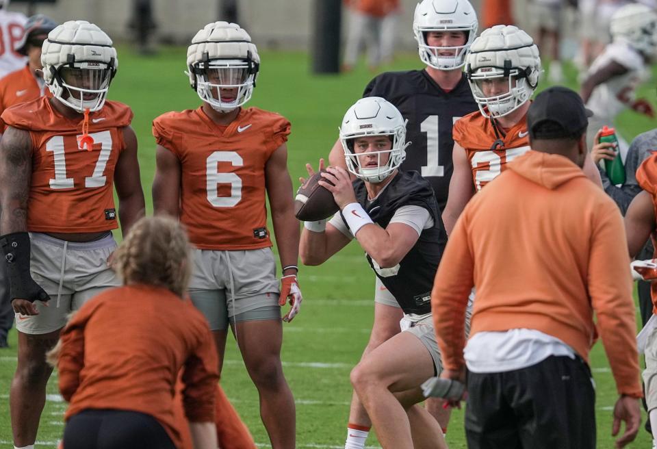 Texas backup quarterback Arch Manning impressed during Saturday's Orange-White game, throwing for 355 yards and a pair of touchdowns.