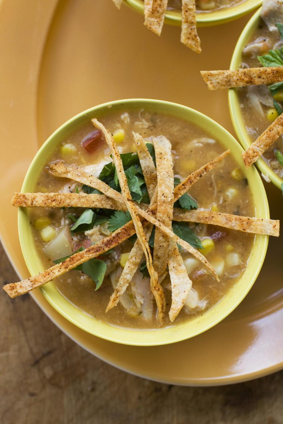 In this image taken on July 8, 2013, southwestern corn and chicken chowder with tortilla crisps is shown in Concord, N.H. (AP Photo/Matthew Mead)