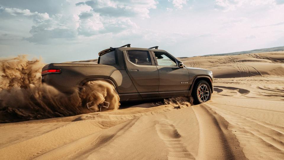 a car driving on a dirt road