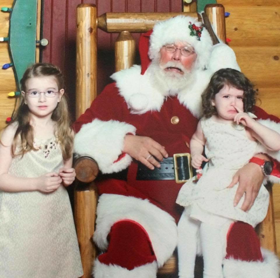 "Here is our classic sad Santa pic!"