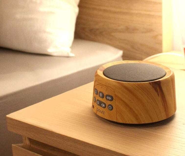 It has 24 soothing sounds for keeping kids fast asleep. Plus, it's portable.<br /><br /><strong>Promising review:</strong> "This was the third (maybe fourth) white noise machine I purchased for my baby/toddler's room and it's still getting the job done after nearly a year. <strong>There's a lot of city traffic and a very busy intersection outside our apartment windows and the Douni masks all of it</strong> (except for the occasional blaring ambulance siren). The wood grain is a nice change of pace from all the other white, black, metallic gadgets populating our home." &mdash; <a href="https://www.buzzfeed.com/jmihaly" target="_blank" rel="noopener noreferrer">John Mihaly</a><br /><br /><strong>Get it from Amazon for <a href="https://amzn.to/3x1dbph" target="_blank" rel="nofollow noopener noreferrer" data-skimlinks-tracking="5669346" data-vars-affiliate="Amazon" data-vars-asin="B07Q5TLB28" data-vars-href="https://www.amazon.com/dp/B07Q5TLB28?tag=bfjohn-20&amp;ascsubtag=5669346%2C19%2C22%2Cmobile_web%2C0%2C0%2C7256033" data-vars-keywords="cleaning,fast fashion" data-vars-link-id="7256033" data-vars-price="" data-vars-product-id="17889879" data-vars-product-img="https://m.media-amazon.com/images/I/51qmxIHaGaL.jpg" data-vars-product-title="Douni Sleep Sound Machine - White Noise Machine with 24 Soothing Sounds for Sleeping &amp; Relaxation, Timer &amp; Memory Function,Sleep Therapy for Kid, Adult, Nursery, Home,Office,Travel.Wood Grain" data-vars-retailers="Amazon">$33.95</a>.</strong>