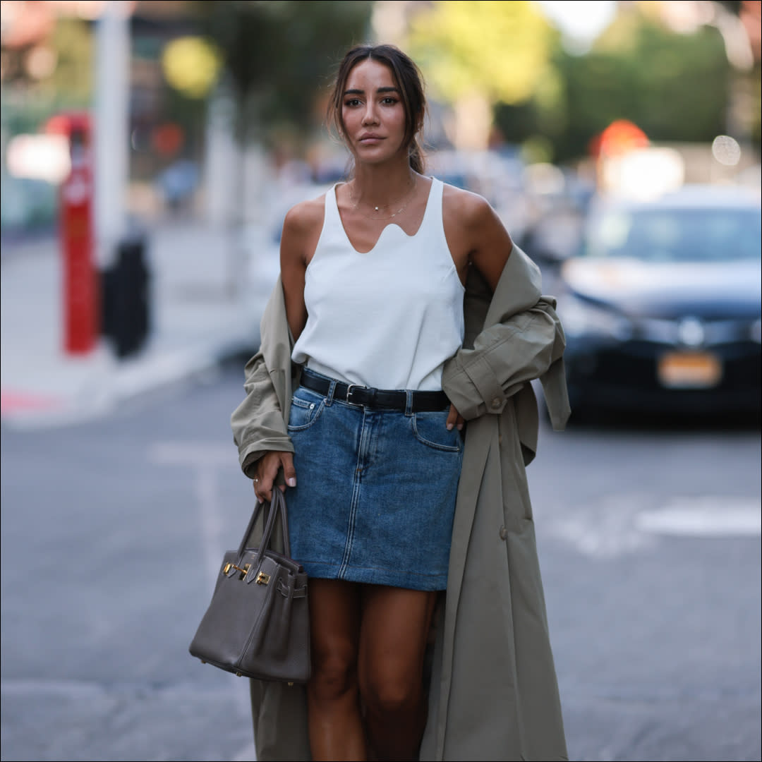  woman in mini skirt outfit, white mini skirt, shirt, yellow blazer 