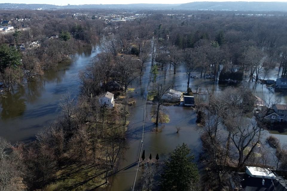 Homes remain flooded along the Pompton River in the southeastern section of Lincoln Park, NJ on Thursday Dec. 21, 2023.
