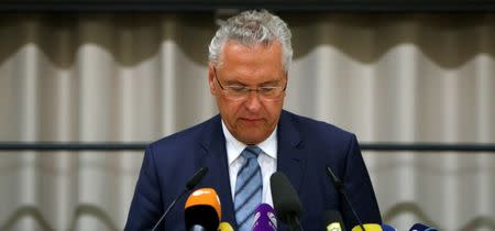 Bavarian Interior Minister Joachim Herrmann addresses a news conference after an explosion in Ansbach, near Nuremberg, Germany July 25, 2016. REUTERS/Michaela Rehle