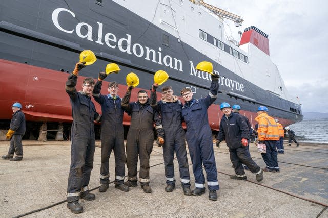 Workers posing in front of the Glen Rosa before its launch