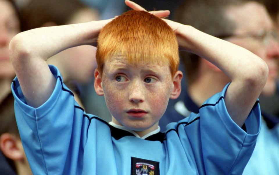 A young Coventry fan watches as his team is beaten by Aston Villa and relegated from the Premier League in 2001 - Steve Ogrizovic interview: Our new fans think Coventry always win –  I can tell them otherwise - Colorsport/Nick Kidd