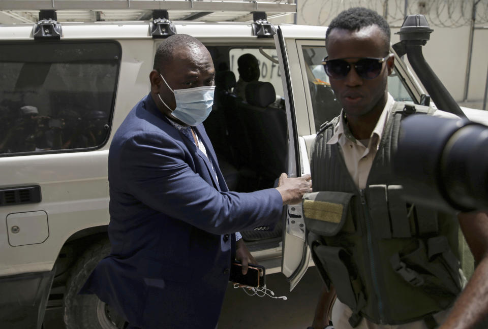 Haiti's General Prosecutor Bed-Ford Claude, who is investigating the assassination of President Jovenel Moise, arrives to his office in Port-au-Prince, Wednesday, July 14, 2021. Moise was assassinated on July 7. (AP Photo/Joseph Odelyn)
