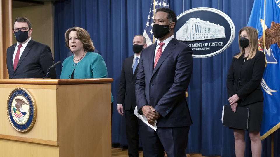 Deputy Attorney General Lisa Monaco, second from left, together with, from left, Deputy Executive Director Jean-Philippe Lecouffe of Europol; FBI Deputy Director Paul Abbate; Assistant Attorney General Kenneth Polite Jr. of the Justice Department's Criminal Division; and Drug Enforcement Administration Administrator Anne Milgram, speaks during a news at the Department of Justice in Washington, Tuesday, Oct. 26, 2021. Law enforcement officials in the U.S. and Europe have arrested 150 people and seized more than $31 million in an international drug trafficking investigation stemming from sales on the darknet. AP Photo/Manuel Balce Ceneta)