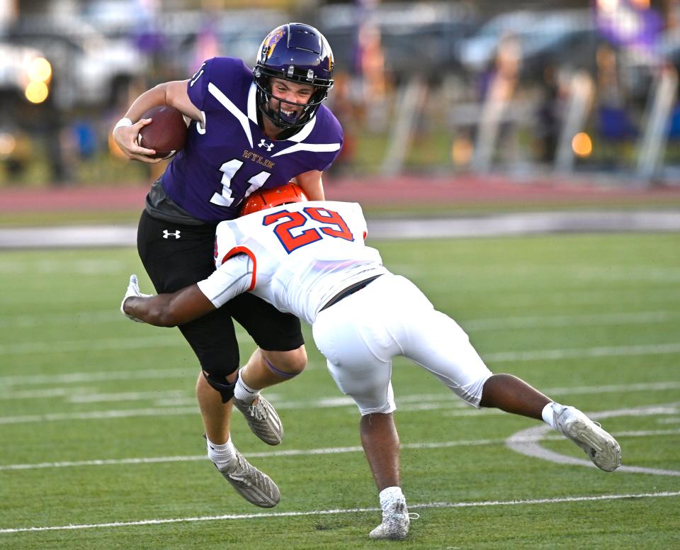 Wylie quarterback Bear Meng is tackled by San Angelo Central linebacker Shawn Scott during Friday’s game in Abilene Sept. 22, 2023. Final score was 37-27, Wylie.