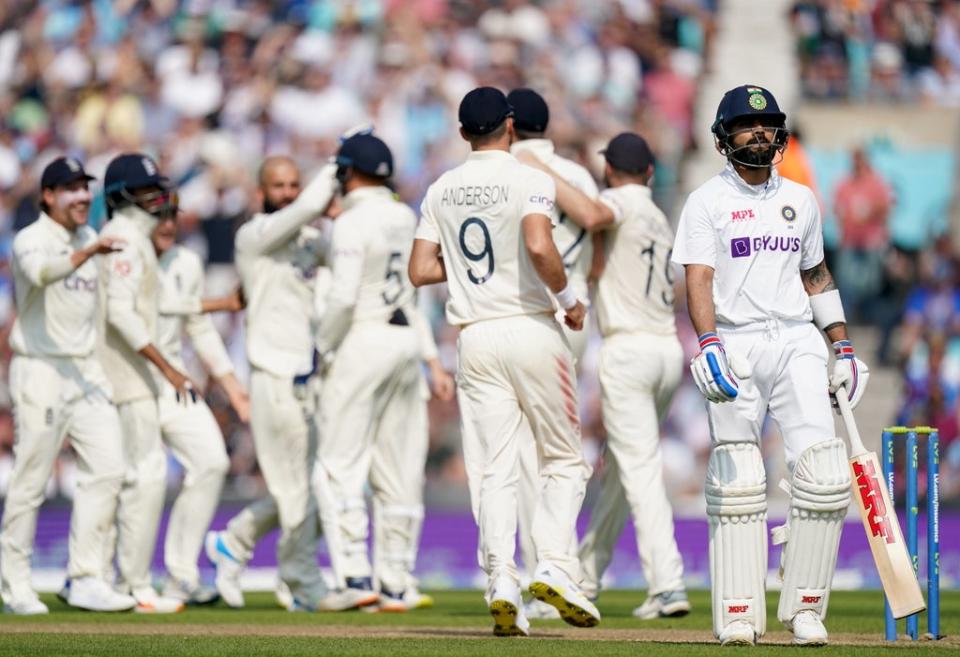 England celebrate taking the wicket of Virat Kohli, right (Adam Davy/PA) (PA Wire)