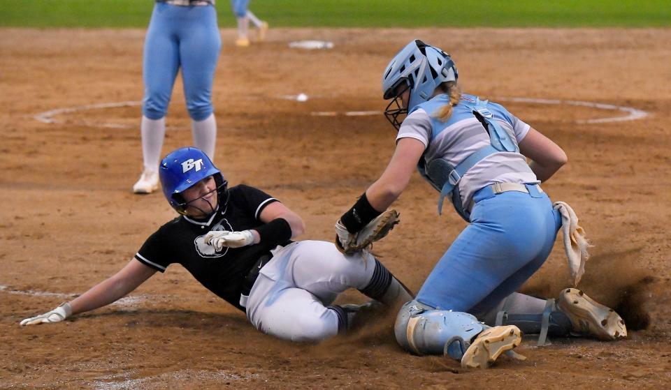 Ponte Vedra catcher Caiden Oliva (6) makes the tag at home plate against Bartram Trail during a 2023 game.