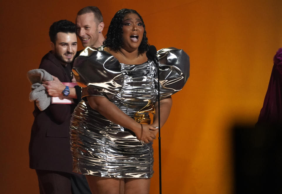 Lizzo accepts the award for record of the year for "About Damn Time" at the 65th annual Grammy Awards on Sunday, Feb. 5, 2023, in Los Angeles. (AP Photo/Chris Pizzello)