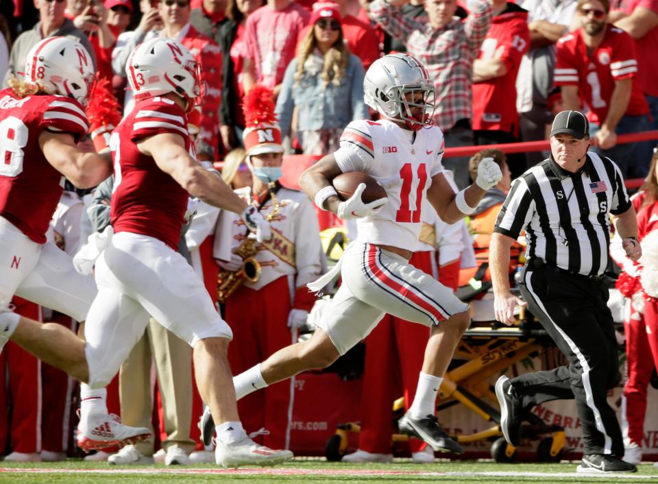 Ohio State Buckeyes wide receiver Jaxon Smith-Njigba (11) breaks away and runs down the field to score a second-quarter touchdown.